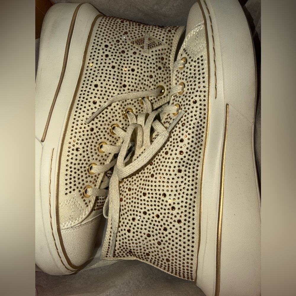 Skechers Women's Cream High-Top Sneakers with Gold Accents